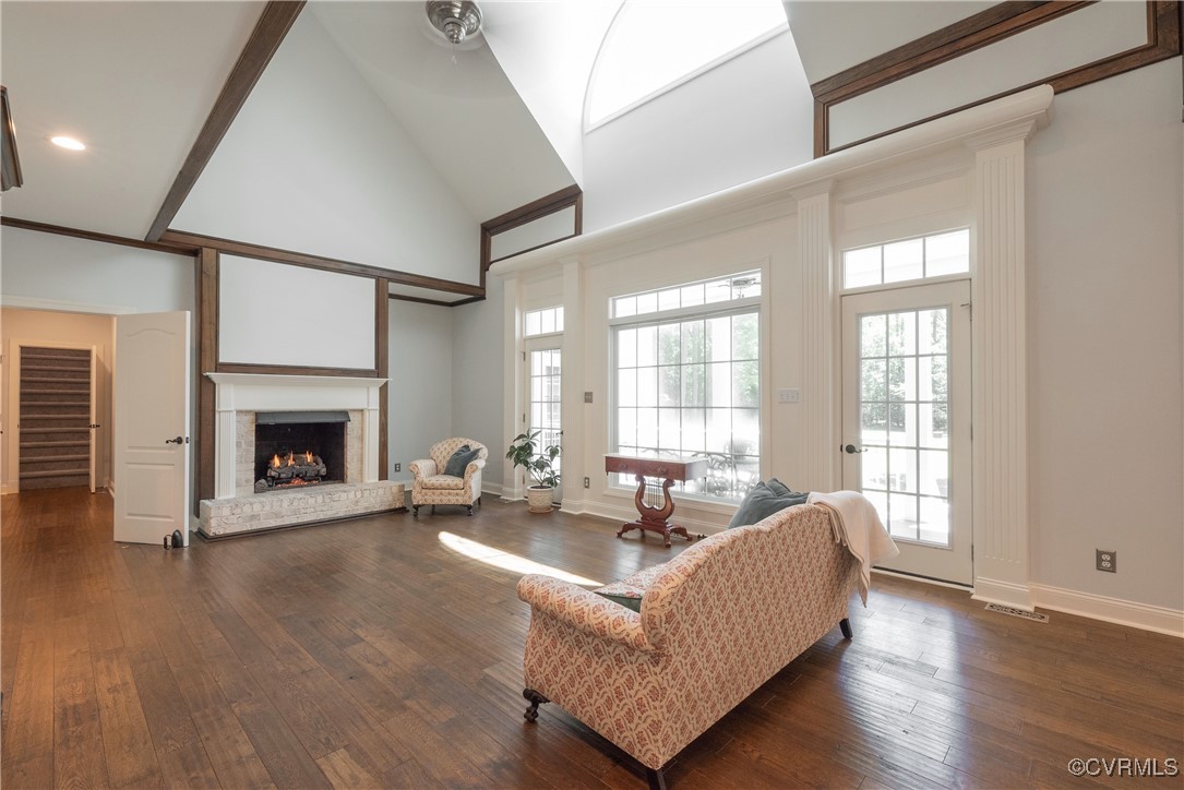 8907 First Branch Lane Chesterfield, VA 23838 - Photo 11 of 50 Living room with high vaulted ceiling, a brick fir