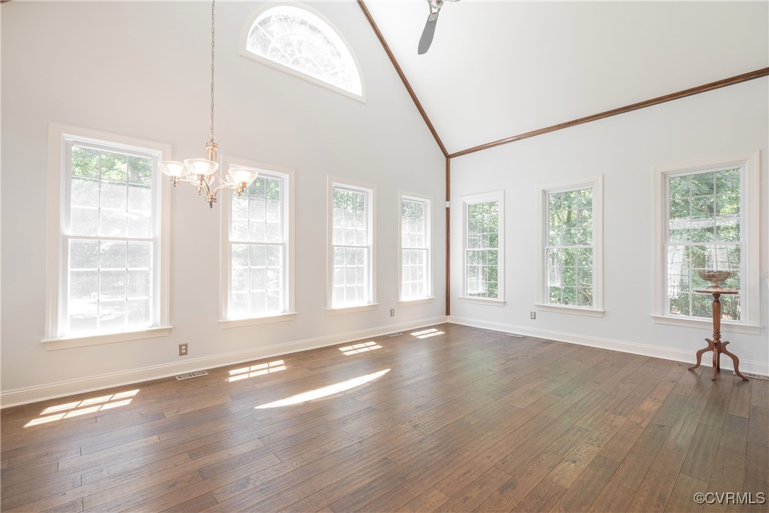 8907 First Branch Lane Chesterfield, VA 23838 - Photo 12 of 50 a view of an empty room with a window and wooden floor