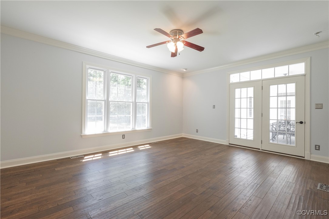 8907 First Branch Lane Chesterfield, VA 23838 - Photo 22 of 50 a view of an empty room with wooden floor and a window