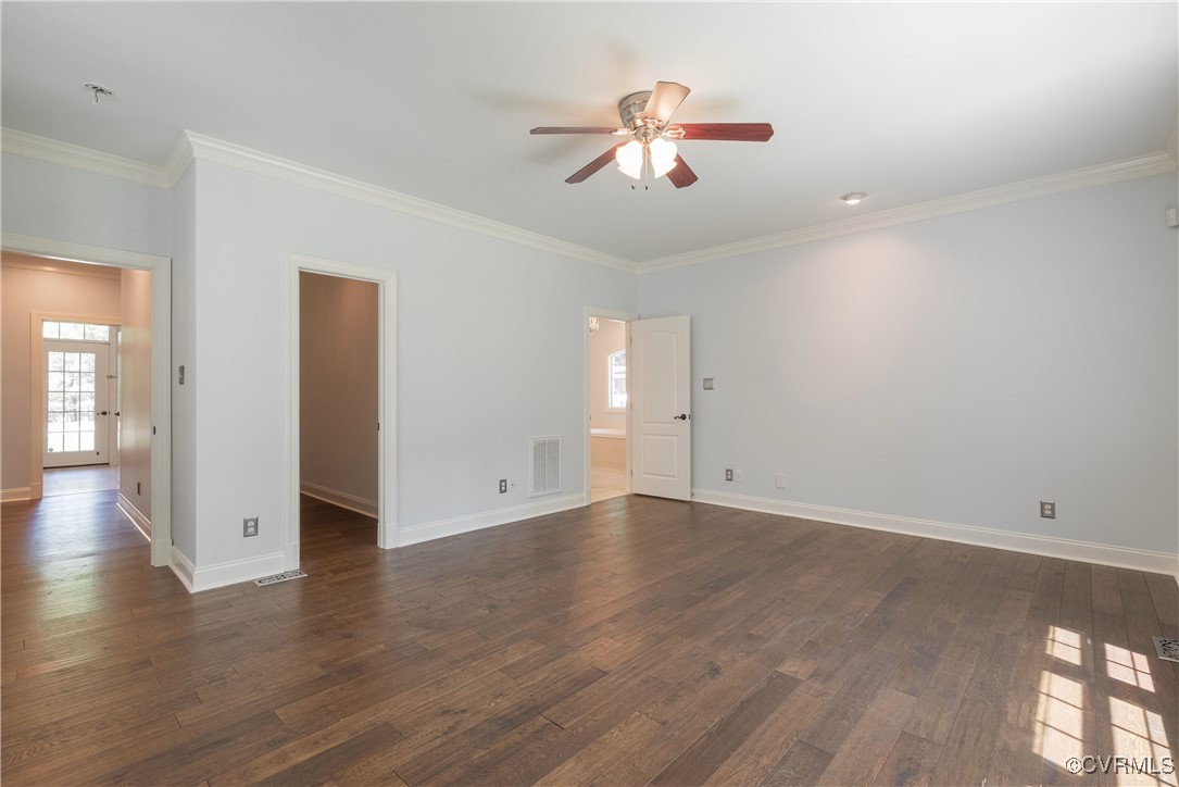 8907 First Branch Lane Chesterfield, VA 23838 - Photo 24 of 50 an empty room with wooden floor chandelier fan and windows