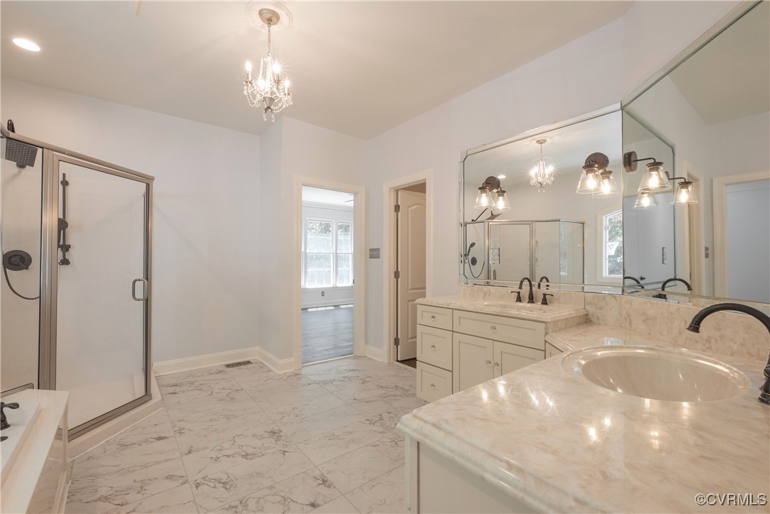 8907 First Branch Lane Chesterfield, VA 23838 - Photo 25 of 50 a spacious bathroom with a granite countertop sink a mirror and shower