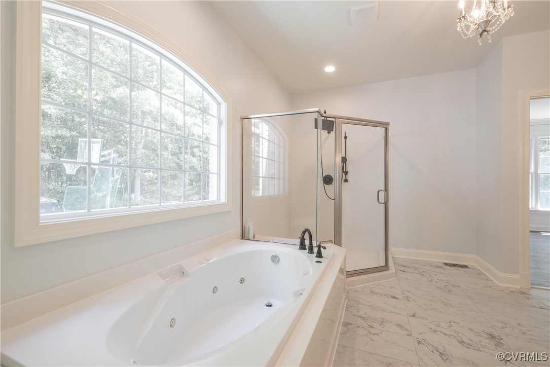 8907 First Branch Lane Chesterfield, VA 23838 - Photo 26 of 50 a bathroom with a bathtub and a shower