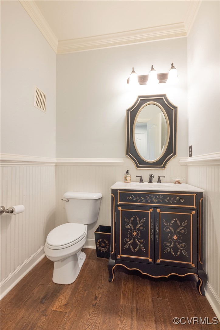 8907 First Branch Lane Chesterfield, VA 23838 - Photo 30 of 50 First Floor half bathroom with wainscoting, wood f