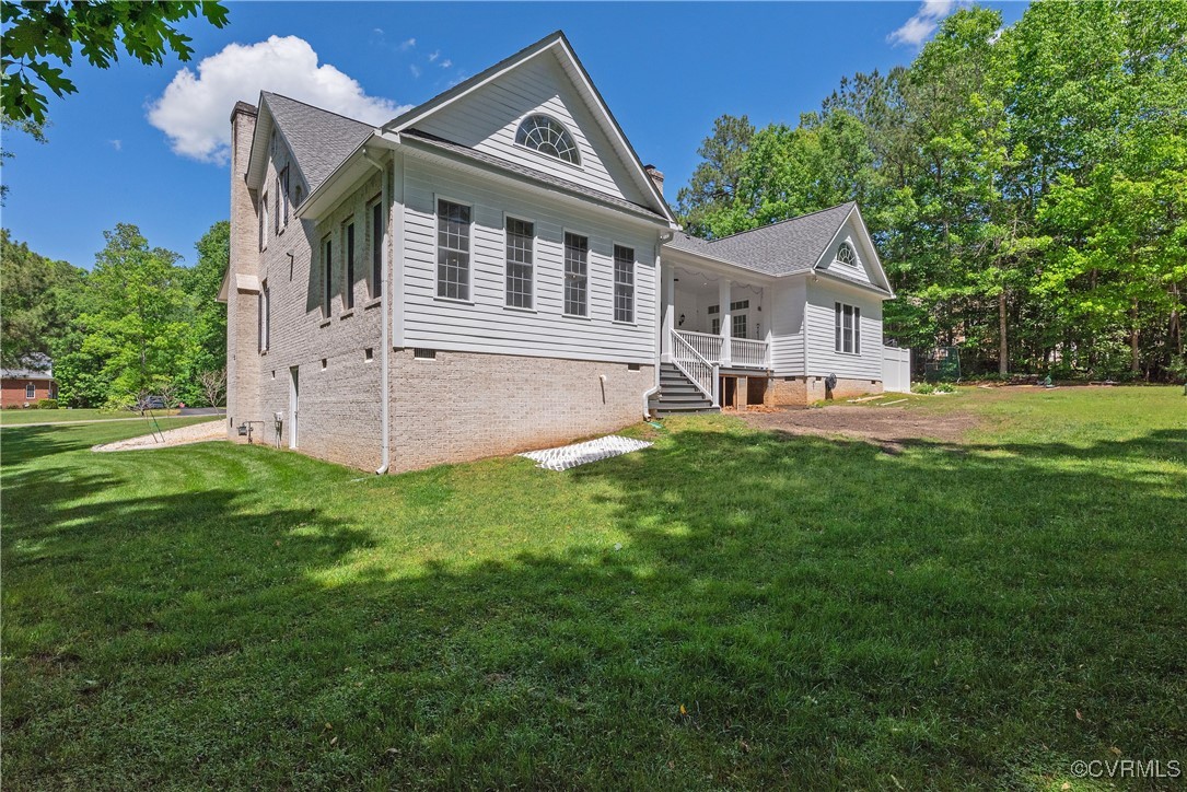 8907 First Branch Lane Chesterfield, VA 23838 - Photo 49 of 50 a front view of a house with a yard