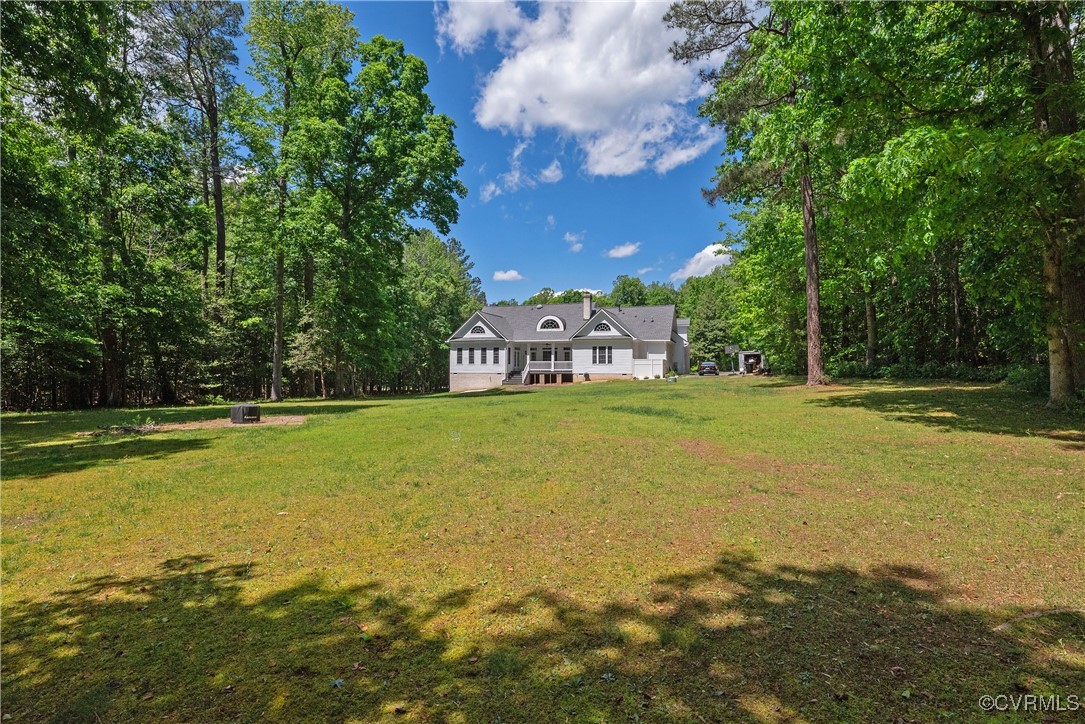8907 First Branch Lane Chesterfield, VA 23838 - Photo 50 of 50 a view of a swimming pool with an outdoor space and seating area