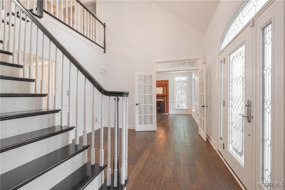 8907 First Branch Lane Chesterfield, VA 23838 - Photo 7 of 50 a view of staircase with wooden floor and white walls