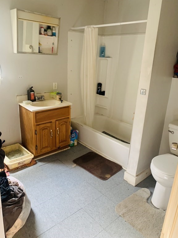 30-32 Stanley Street Lowell, MA 01850 - Photo 4 of 9 a room with a washer and dryer