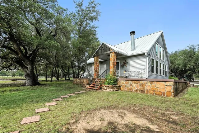 a front view of house with yard