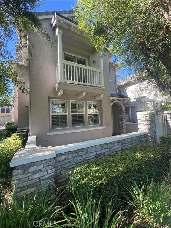 a view of a house with a garden
