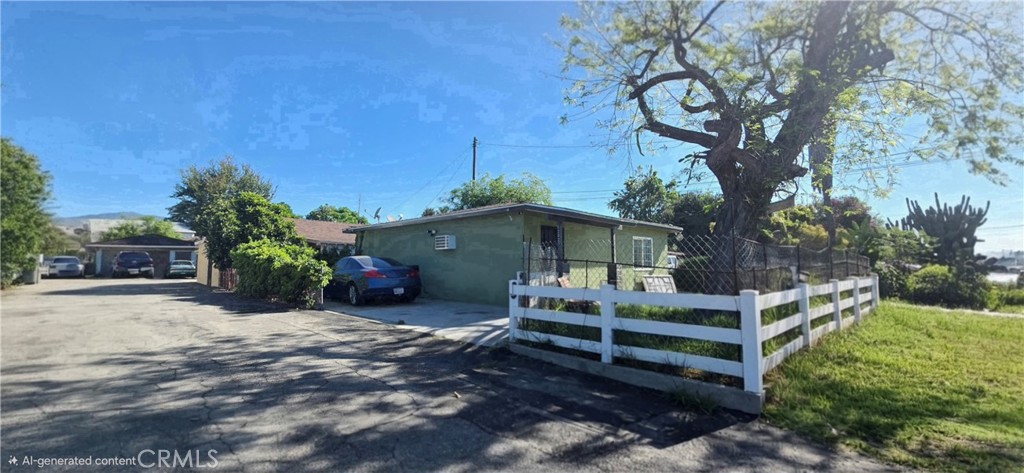 12025 Conference Street El Monte, CA 91732 - Photo 2 of 4 a view of a house with a yard and sitting area