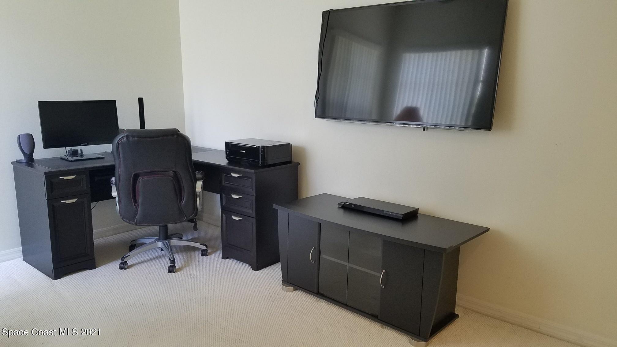 2492 Addington Circle Rockledge, FL 32955 - Photo 21 of 34 a view of a workspace with furniture