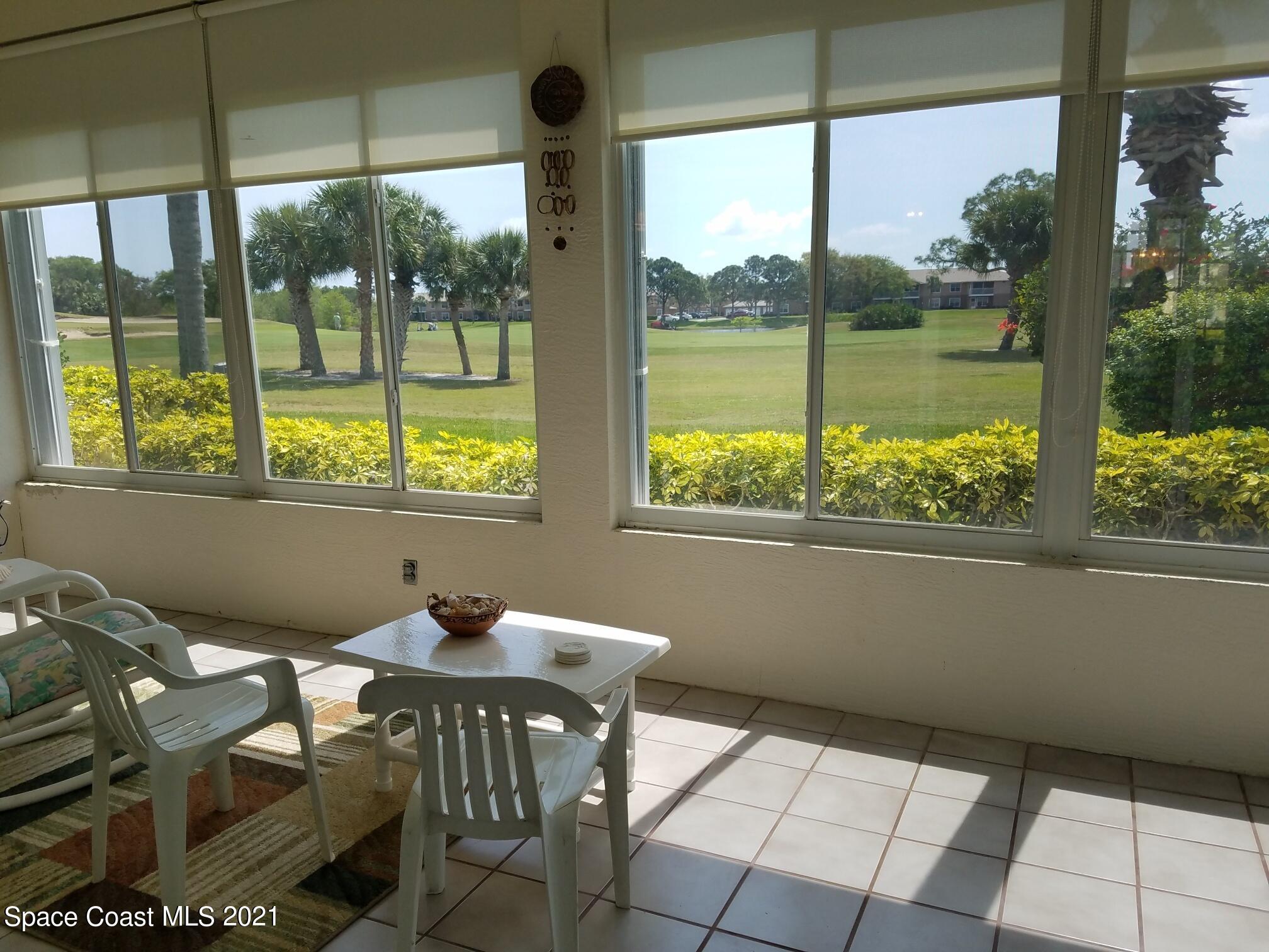 2492 Addington Circle Rockledge, FL 32955 - Photo 24 of 34 a view of a dining room with furniture window and outside view
