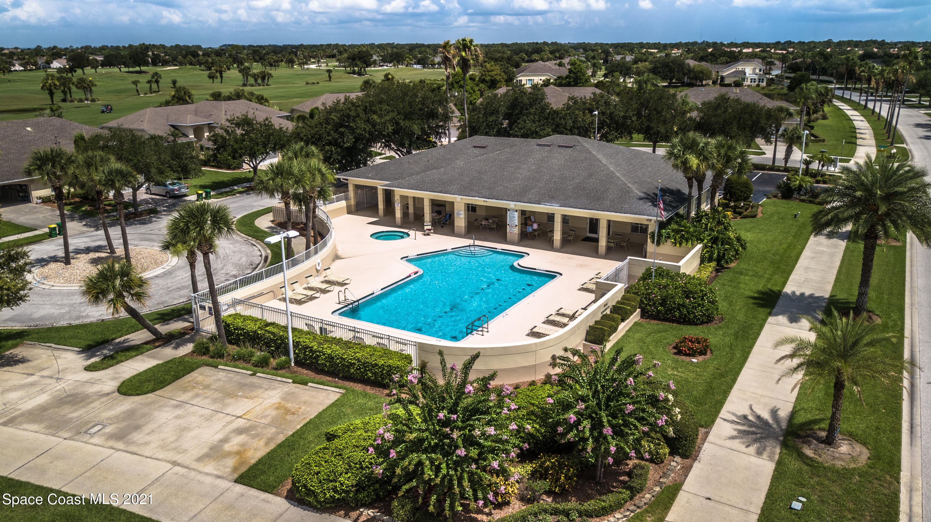 2492 Addington Circle Rockledge, FL 32955 - Photo 29 of 34 an aerial view of multiple houses with a yard