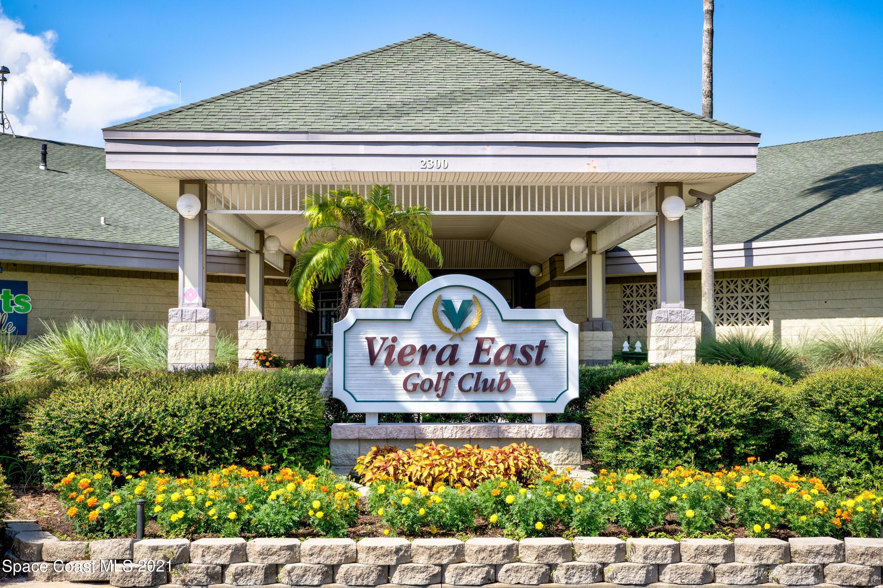 2492 Addington Circle Rockledge, FL 32955 - Photo 31 of 34 a front view of a house with garden