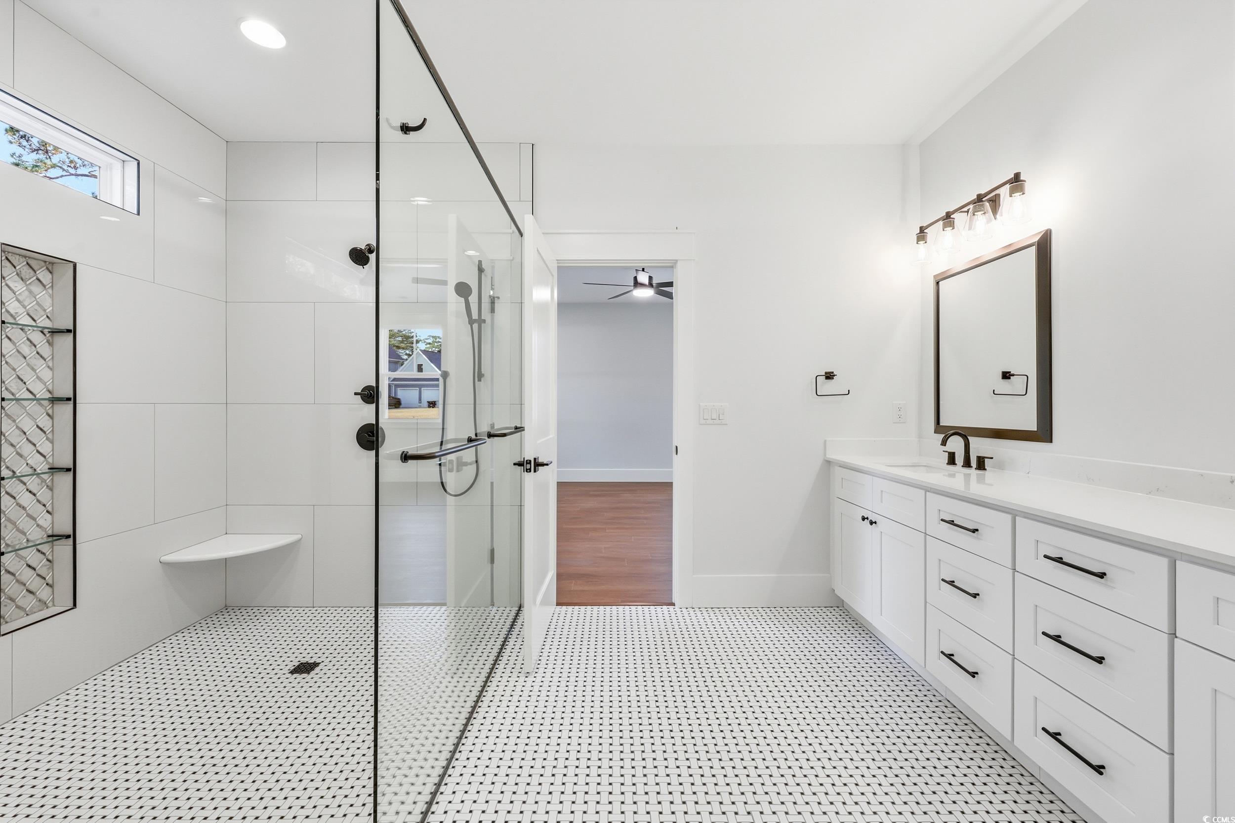 813 Commanders Island Road Georgetown, SC 29440 - Photo 19 of 39 Bathroom featuring vanity, walk in shower, and recessed lighting