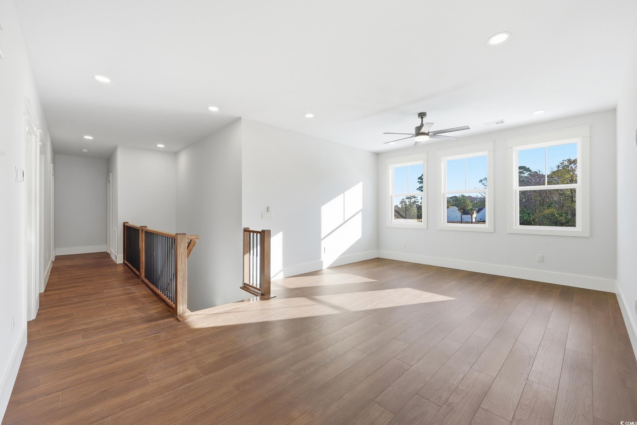 813 Commanders Island Road Georgetown, SC 29440 - Photo 22 of 39 Spare room with wood finished floors, recessed lighting, and ceiling fan