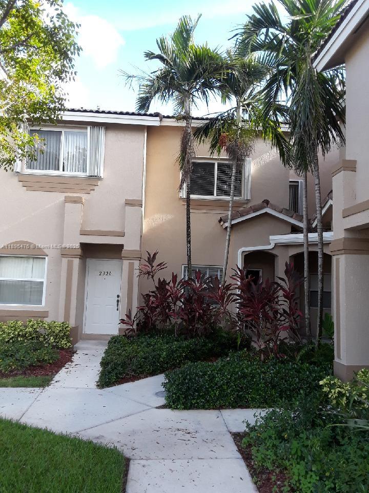 2322 Southeast 23rd Road, Unit 2322 Homestead, FL 33035 - Photo 3 of 11 a view of a house with a backyard