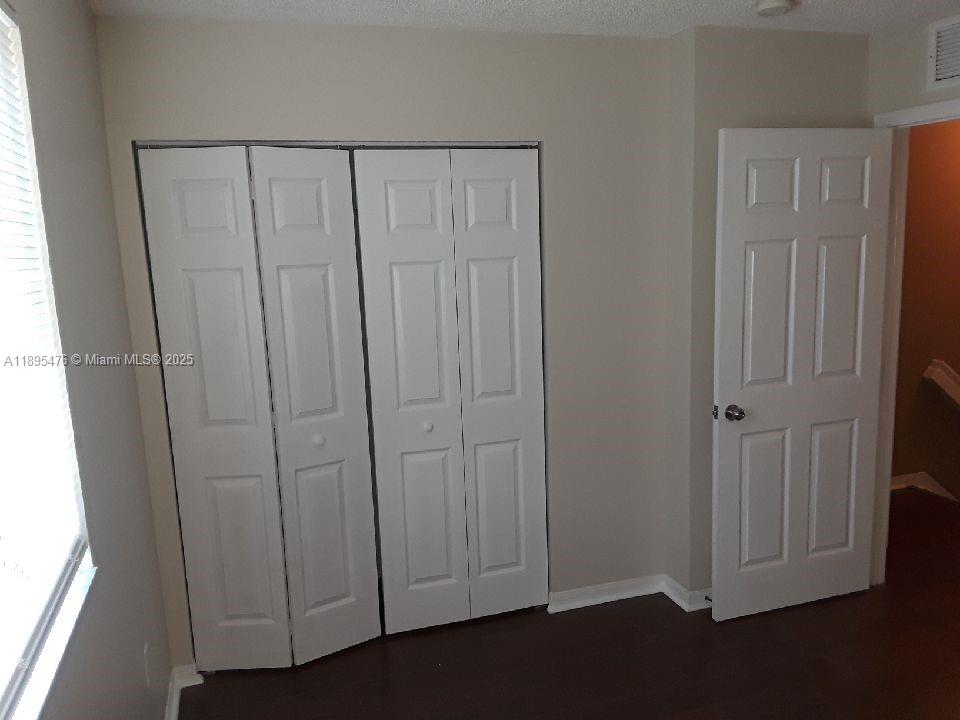 2322 Southeast 23rd Road, Unit 2322 Homestead, FL 33035 - Photo 9 of 11 a view of a hallway