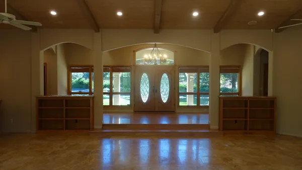 an empty room with windows