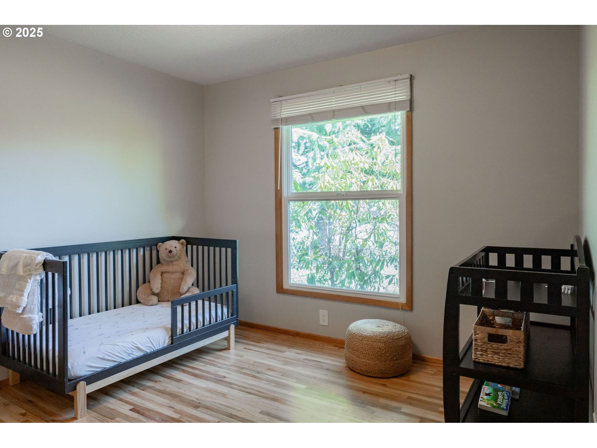 75 Northwest 22nd Street Gresham, OR 97030 - Photo 19 of 32 a bedroom with furniture and a window