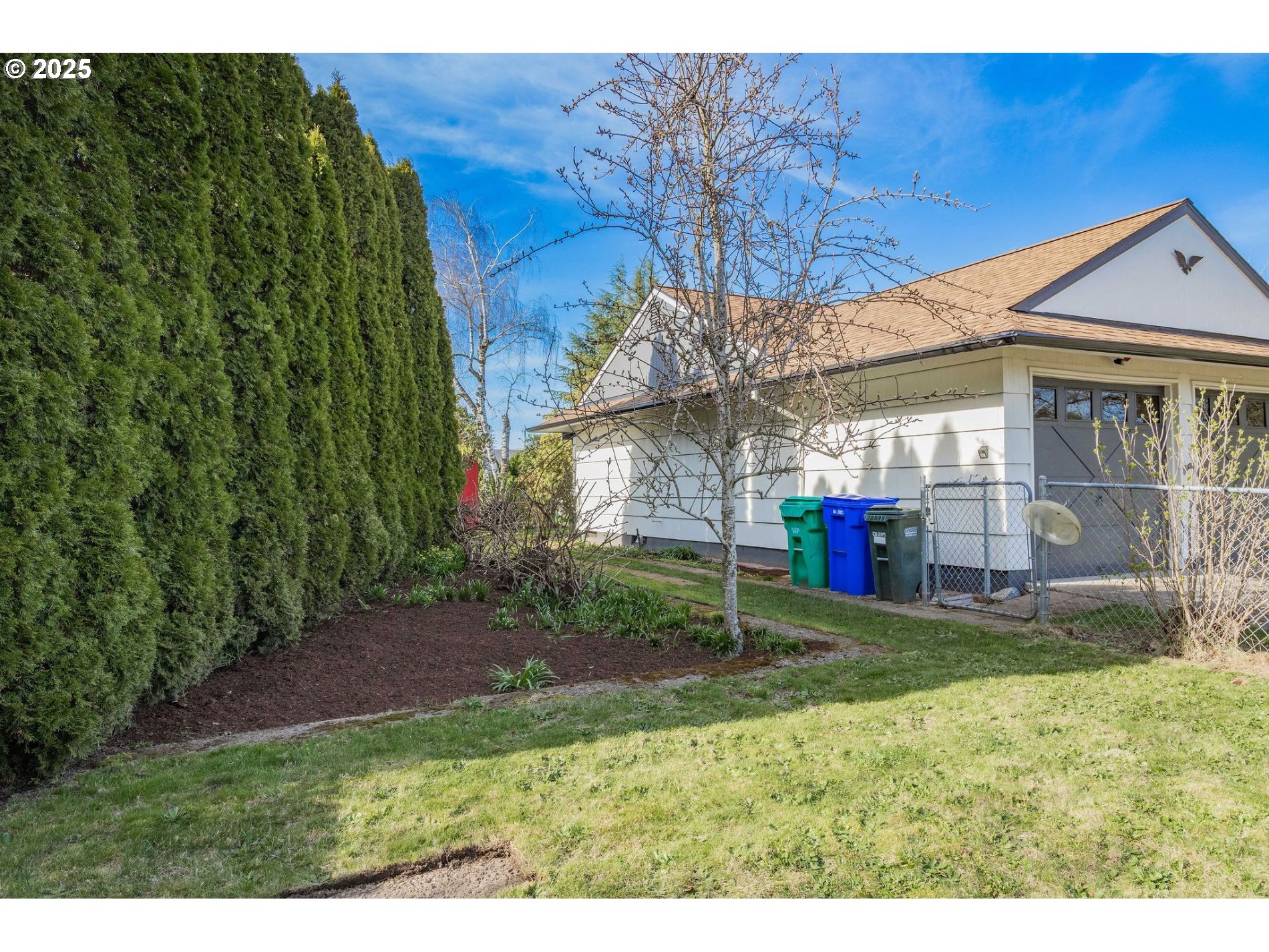 75 Northwest 22nd Street Gresham, OR 97030 - Photo 25 of 32 a view of house with backyard