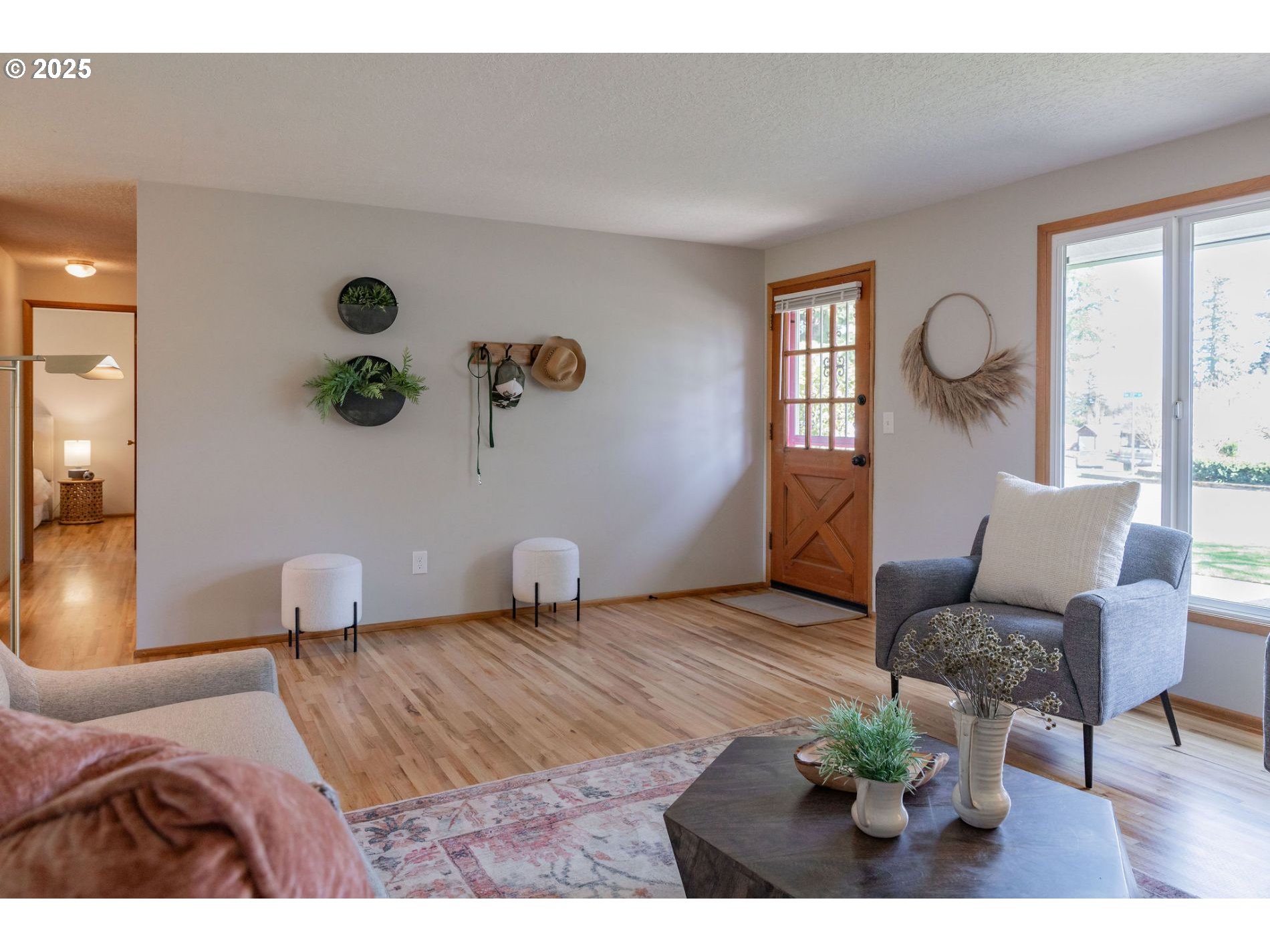 75 Northwest 22nd Street Gresham, OR 97030 - Photo 5 of 32 a bedroom with furniture and a window
