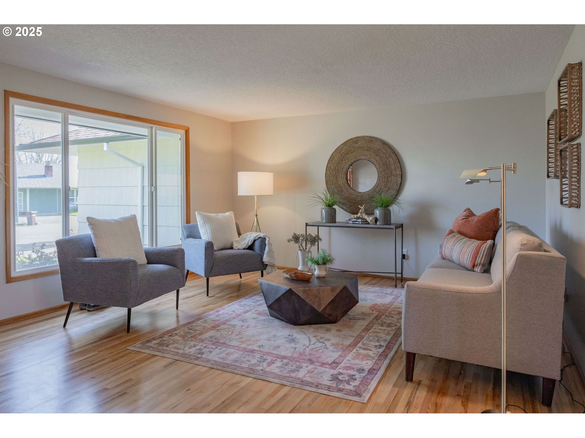 75 Northwest 22nd Street Gresham, OR 97030 - Photo 7 of 32 a living room with furniture and a wooden floor