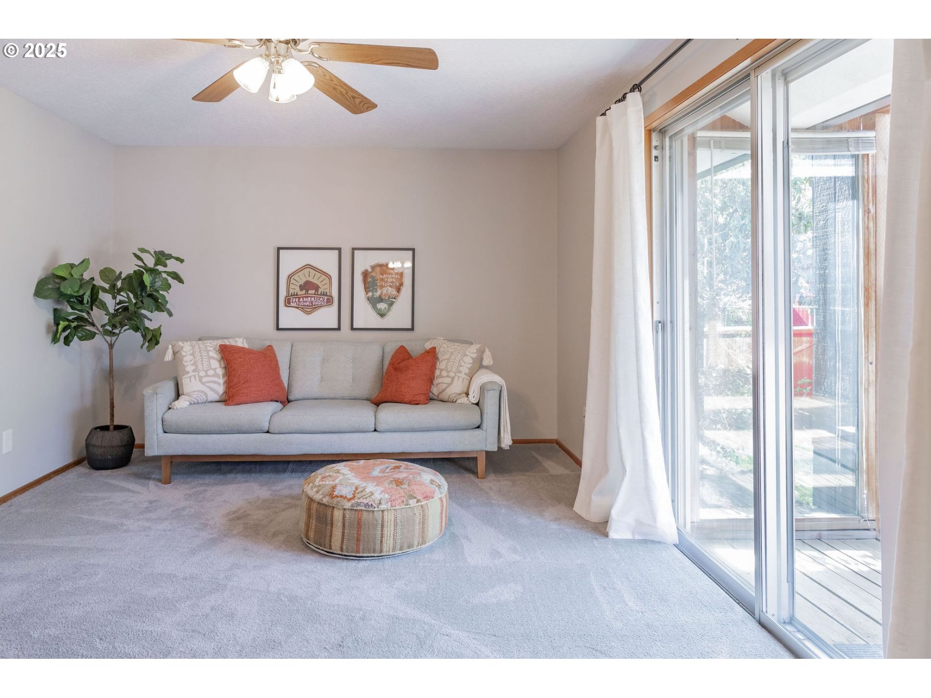 75 Northwest 22nd Street Gresham, OR 97030 - Photo 9 of 32 a living room with furniture and a potted plant