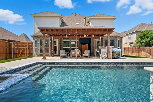 a view of a building with a fountain