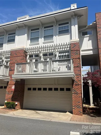 a front view of a house with a balcony