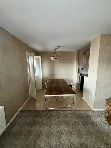 a bathroom with a sink a mirror and shower