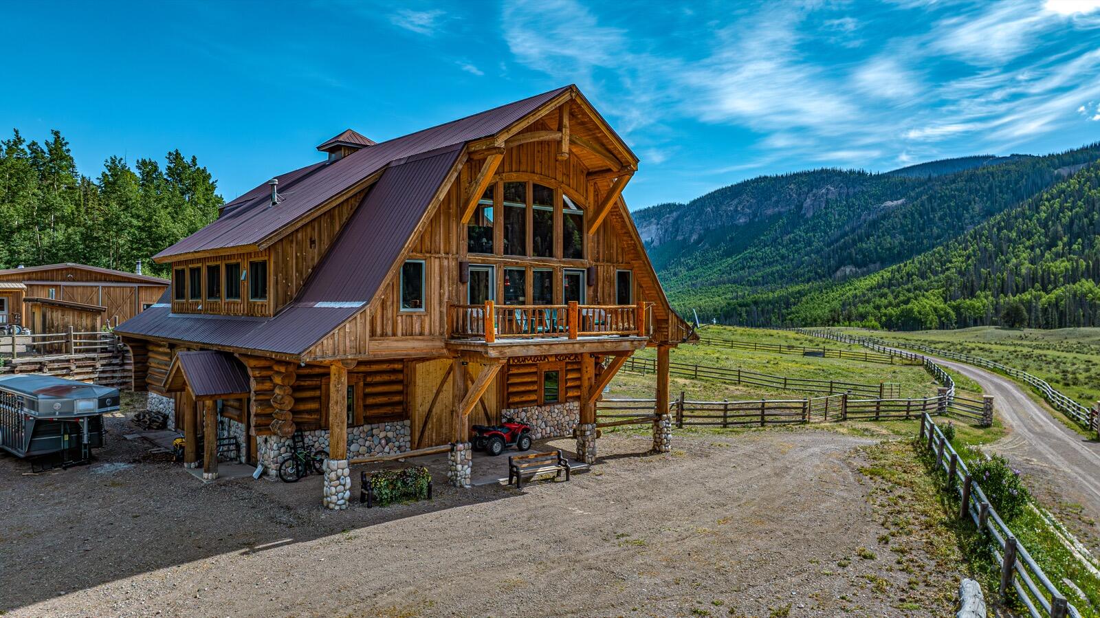 2418 Usfs Road Creede, CO 81130 - Photo 23 of 50 a view of a big house with wooden fence