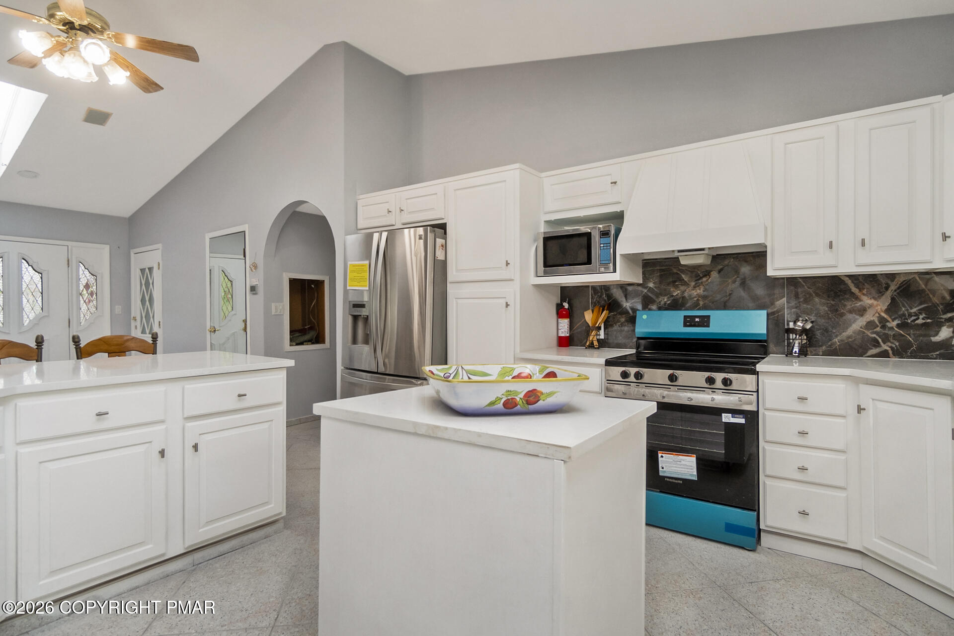 175 Winding Way Albrightsville, PA 18210 - Photo 13 of 54 a kitchen with white cabinets and stainless steel appliances