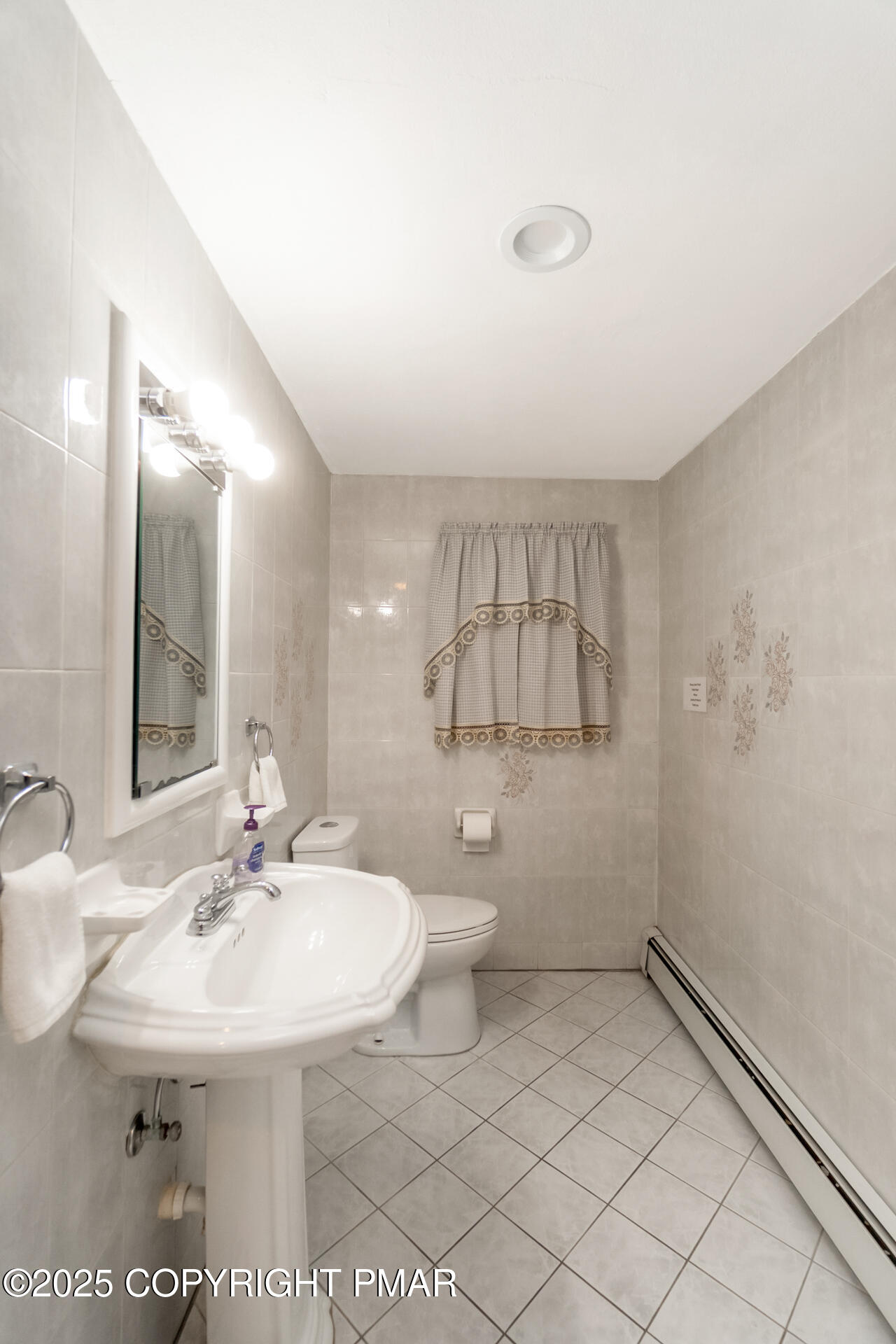 175 Winding Way Albrightsville, PA 18210 - Photo 15 of 50 a bathroom with a sink a toilet and mirror