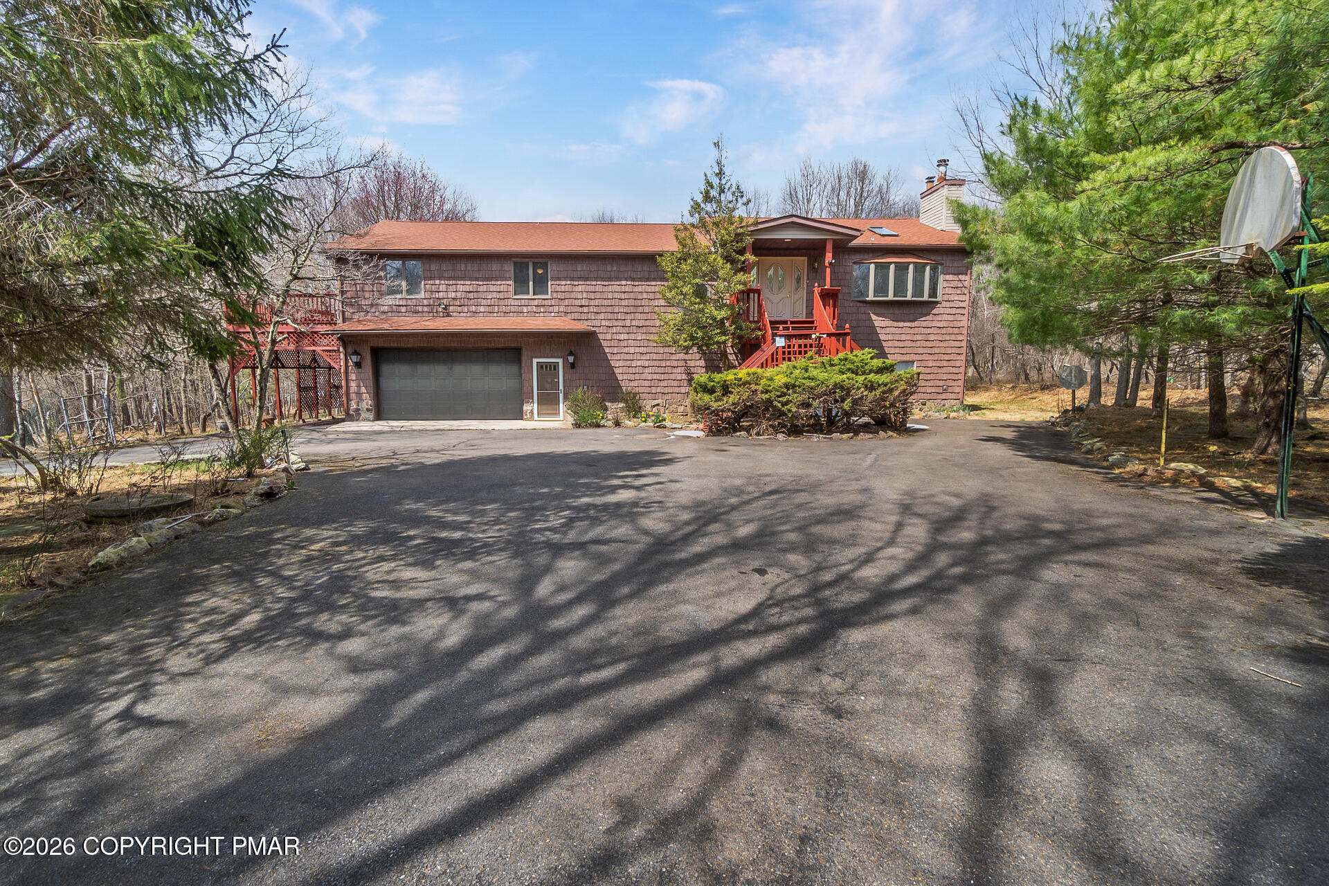 175 Winding Way Albrightsville, PA 18210 - Photo 2 of 54 a front view of a house with a yard and a garage