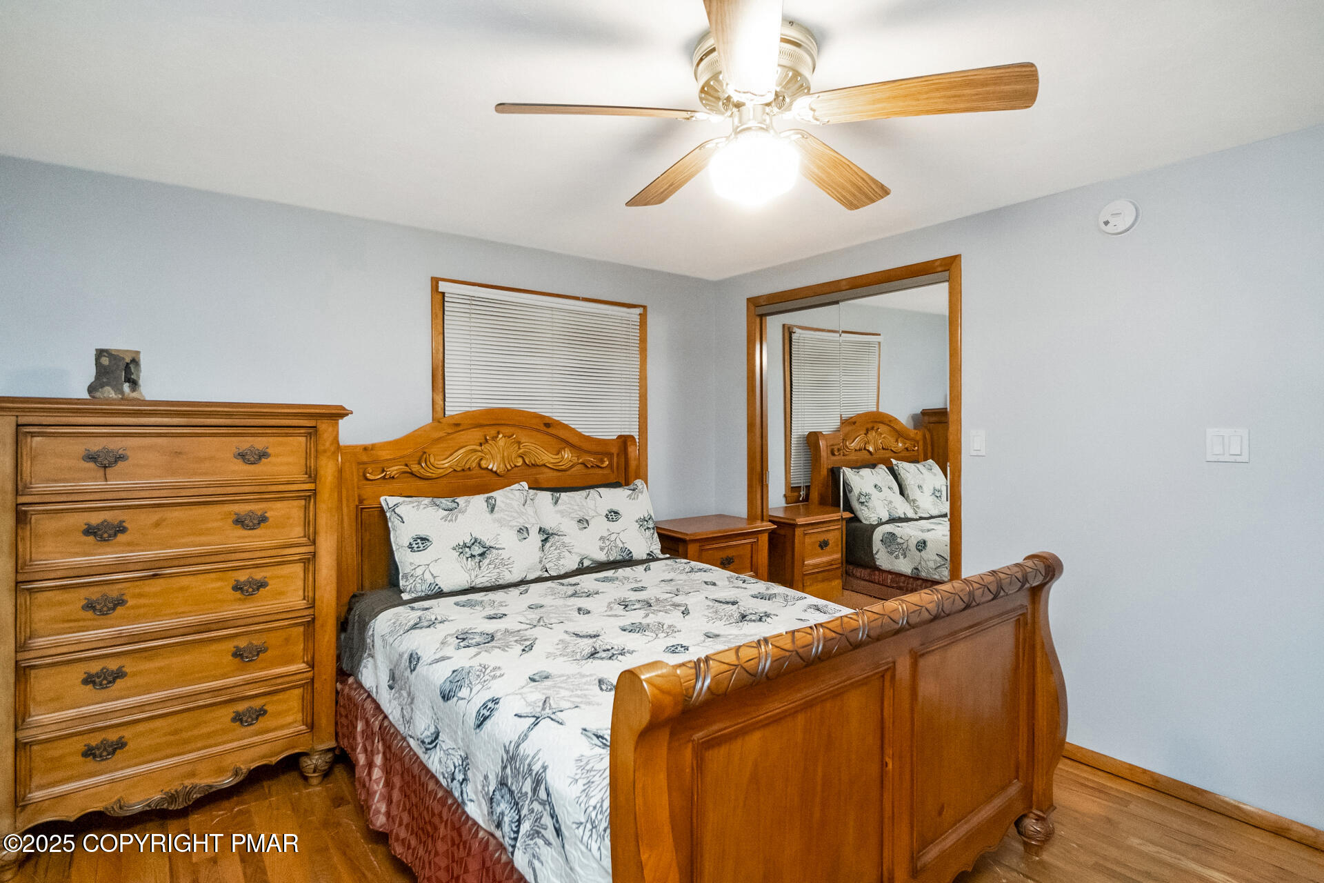 175 Winding Way Albrightsville, PA 18210 - Photo 22 of 50 a bedroom with a bed and a chandelier