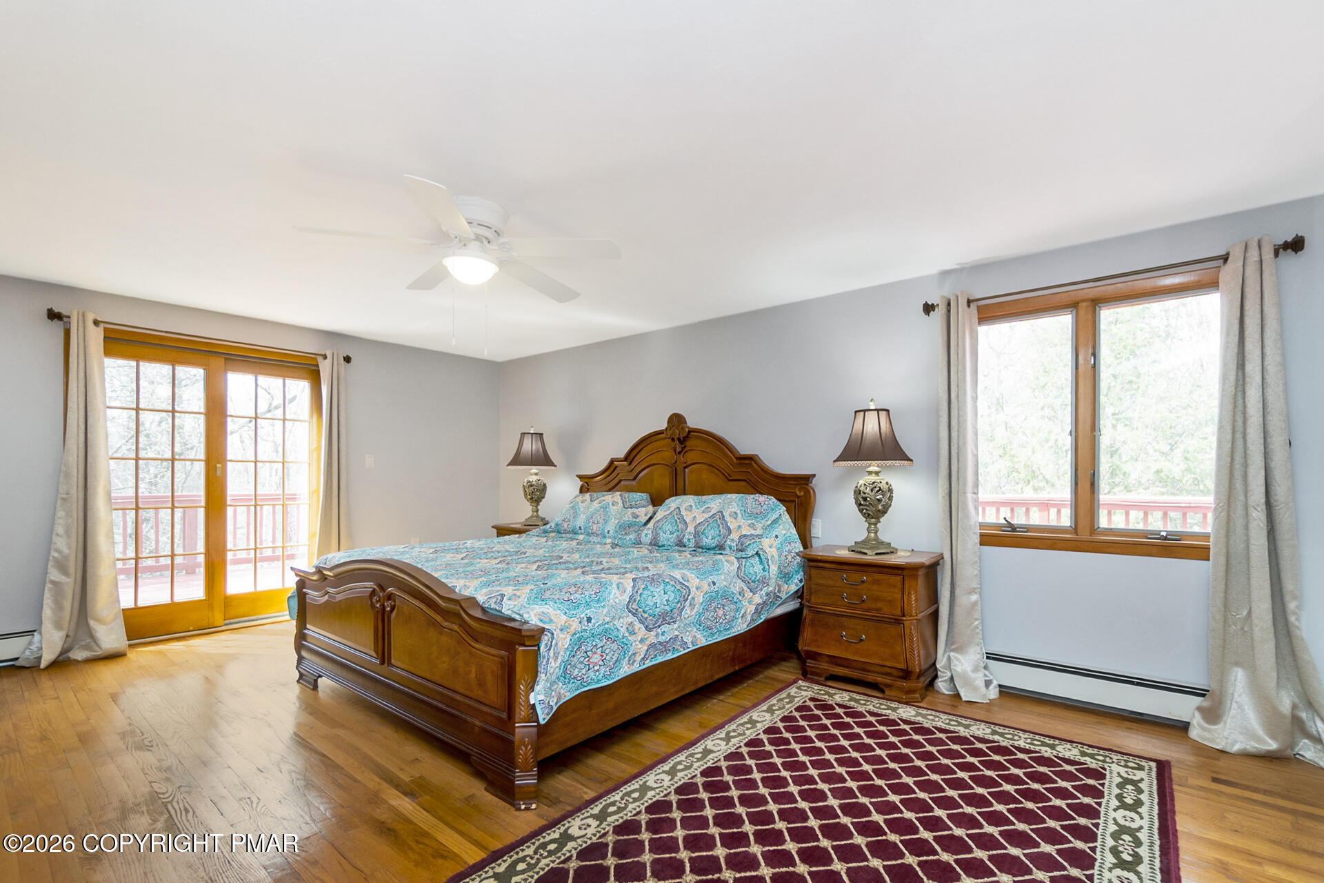 175 Winding Way Albrightsville, PA 18210 - Photo 24 of 54 a bedroom with a bed and wooden floor