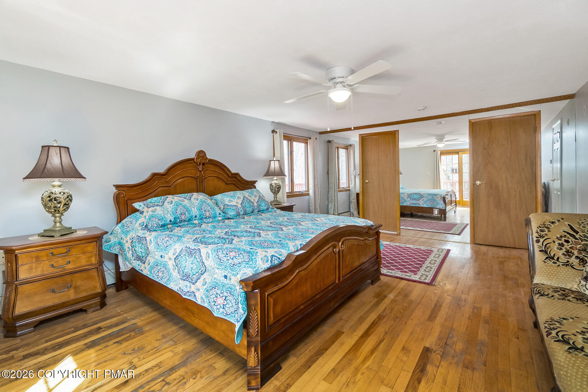 175 Winding Way Albrightsville, PA 18210 - Photo 26 of 54 a bedroom with a bed and wooden floor