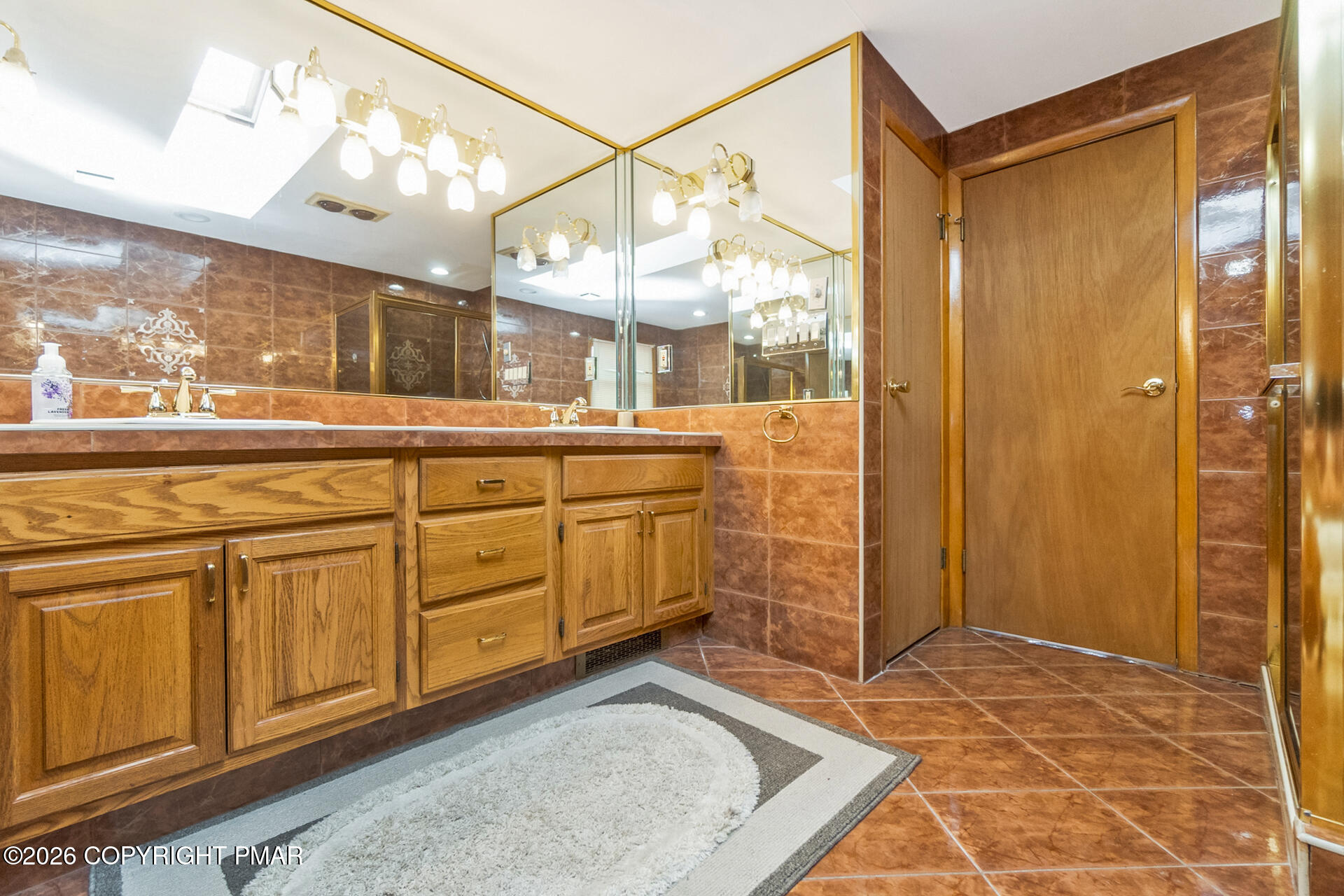 175 Winding Way Albrightsville, PA 18210 - Photo 30 of 54 a bathroom with a sink a mirror and a shower