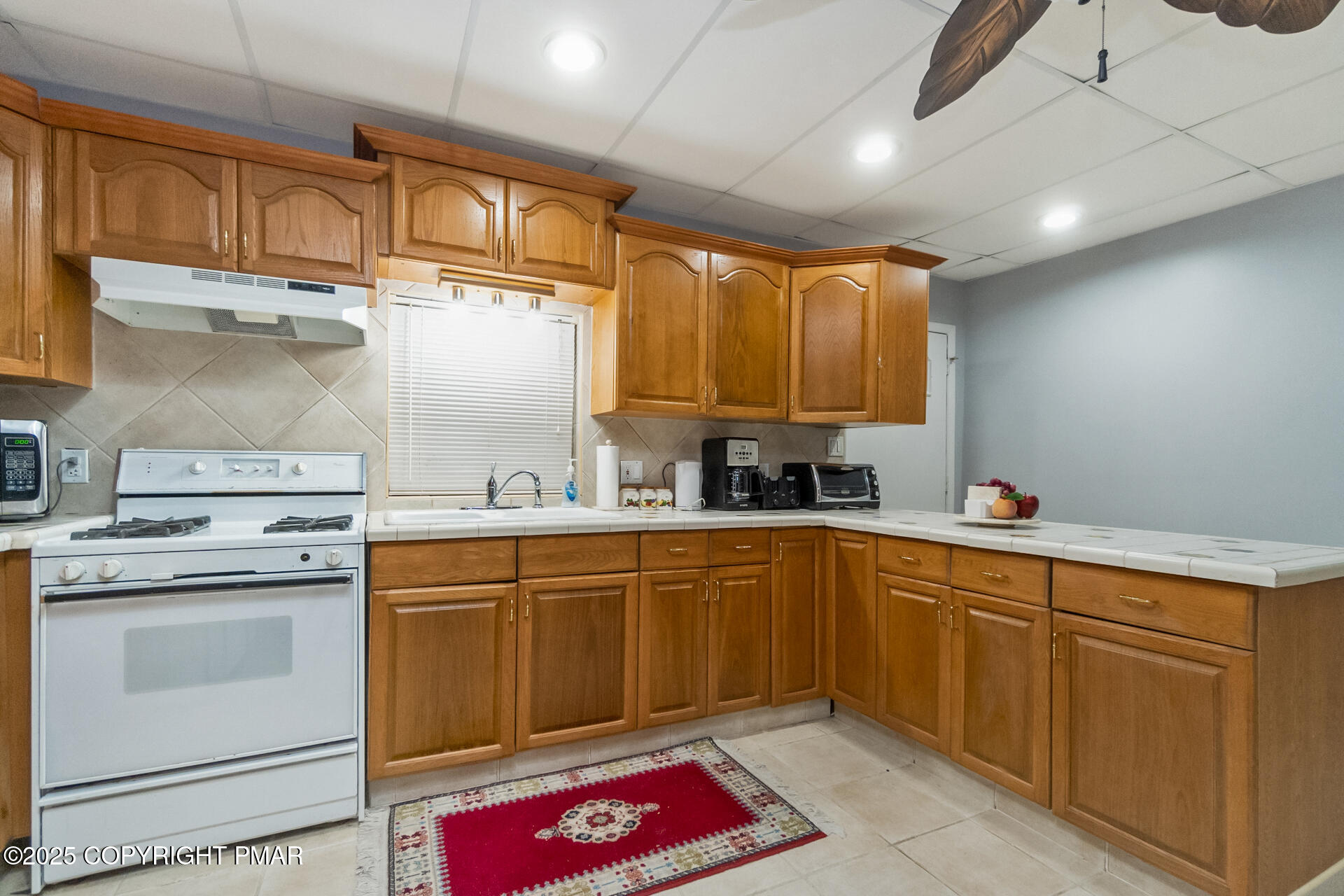 175 Winding Way Albrightsville, PA 18210 - Photo 38 of 50 a kitchen with granite countertop a sink stainless steel appliances and cabinets