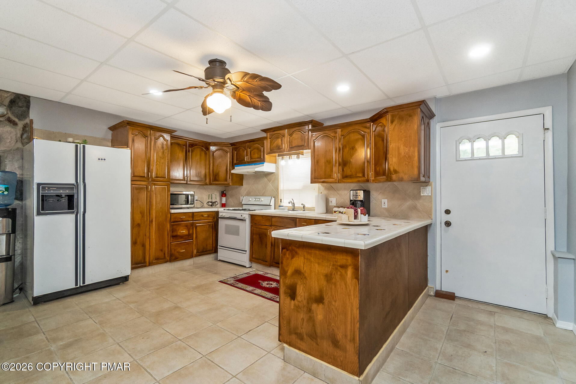175 Winding Way Albrightsville, PA 18210 - Photo 38 of 54 a kitchen with refrigerator a sink and a stove