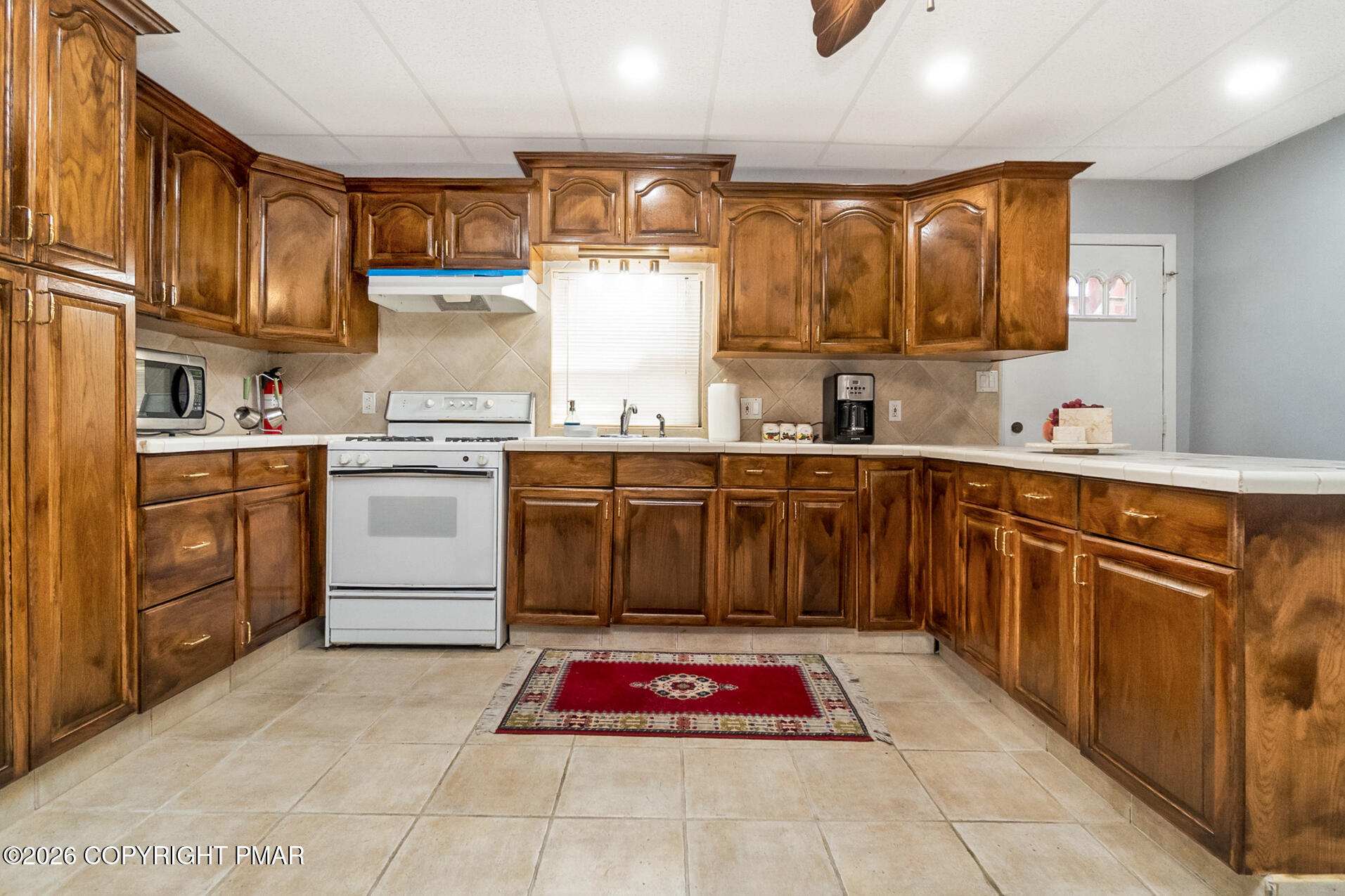 175 Winding Way Albrightsville, PA 18210 - Photo 39 of 54 a kitchen with a sink stove and cabinets