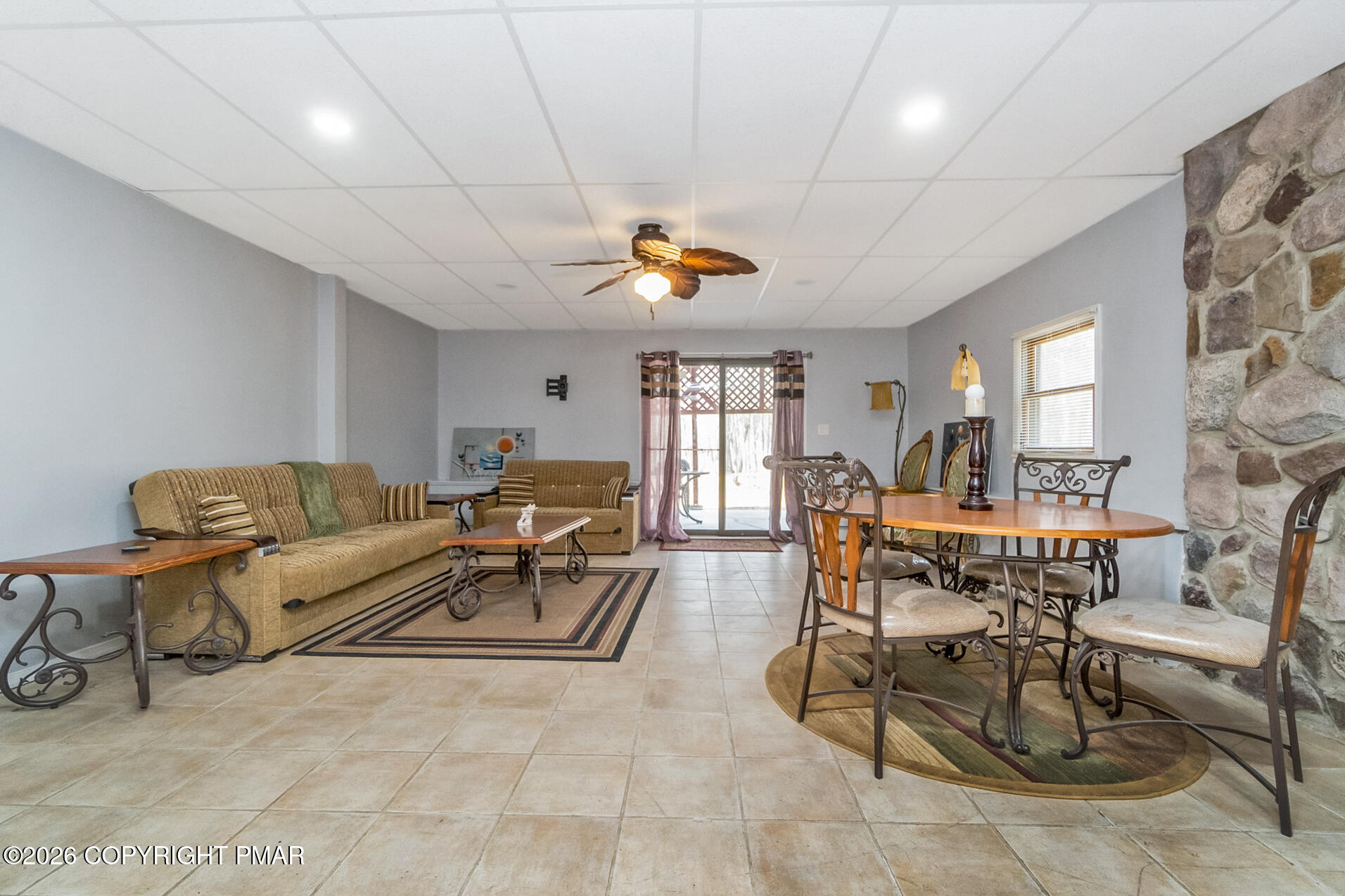 175 Winding Way Albrightsville, PA 18210 - Photo 40 of 54 a living room with furniture a dining table and a chandelier