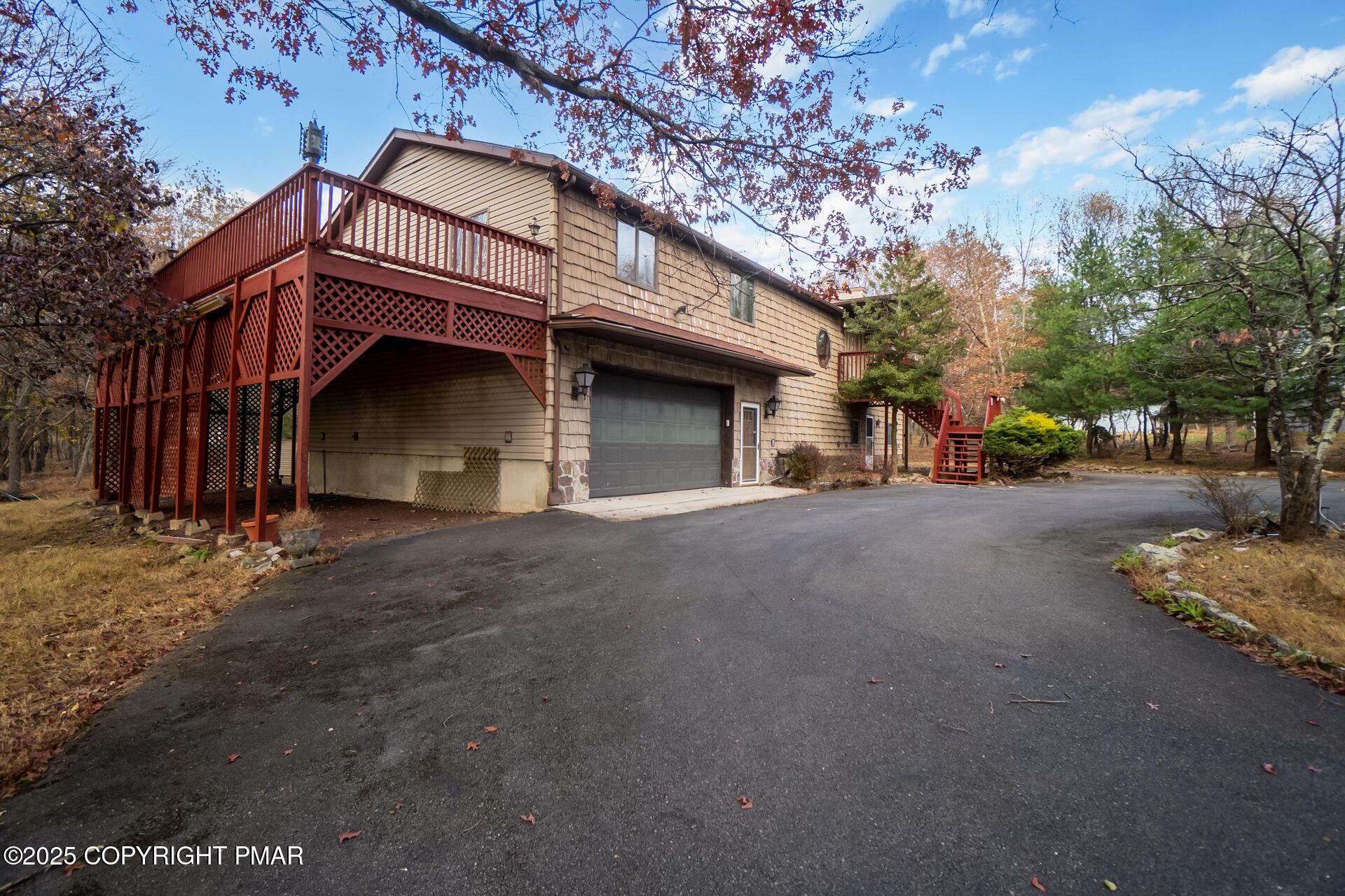 175 Winding Way Albrightsville, PA 18210 - Photo 4 of 50 a house with trees in front of it