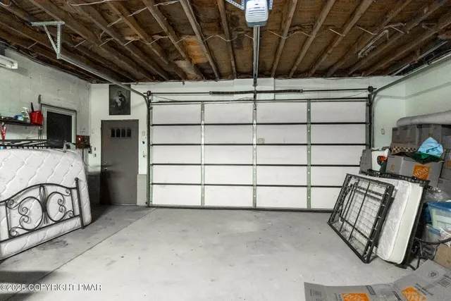 a view of a garage with storage