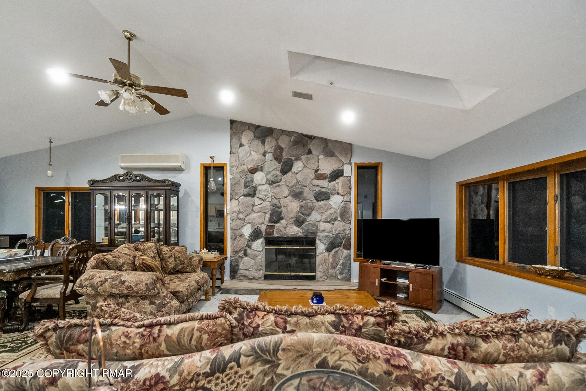 175 Winding Way Albrightsville, PA 18210 - Photo 6 of 50 a living room with furniture a flat screen tv and a fireplace