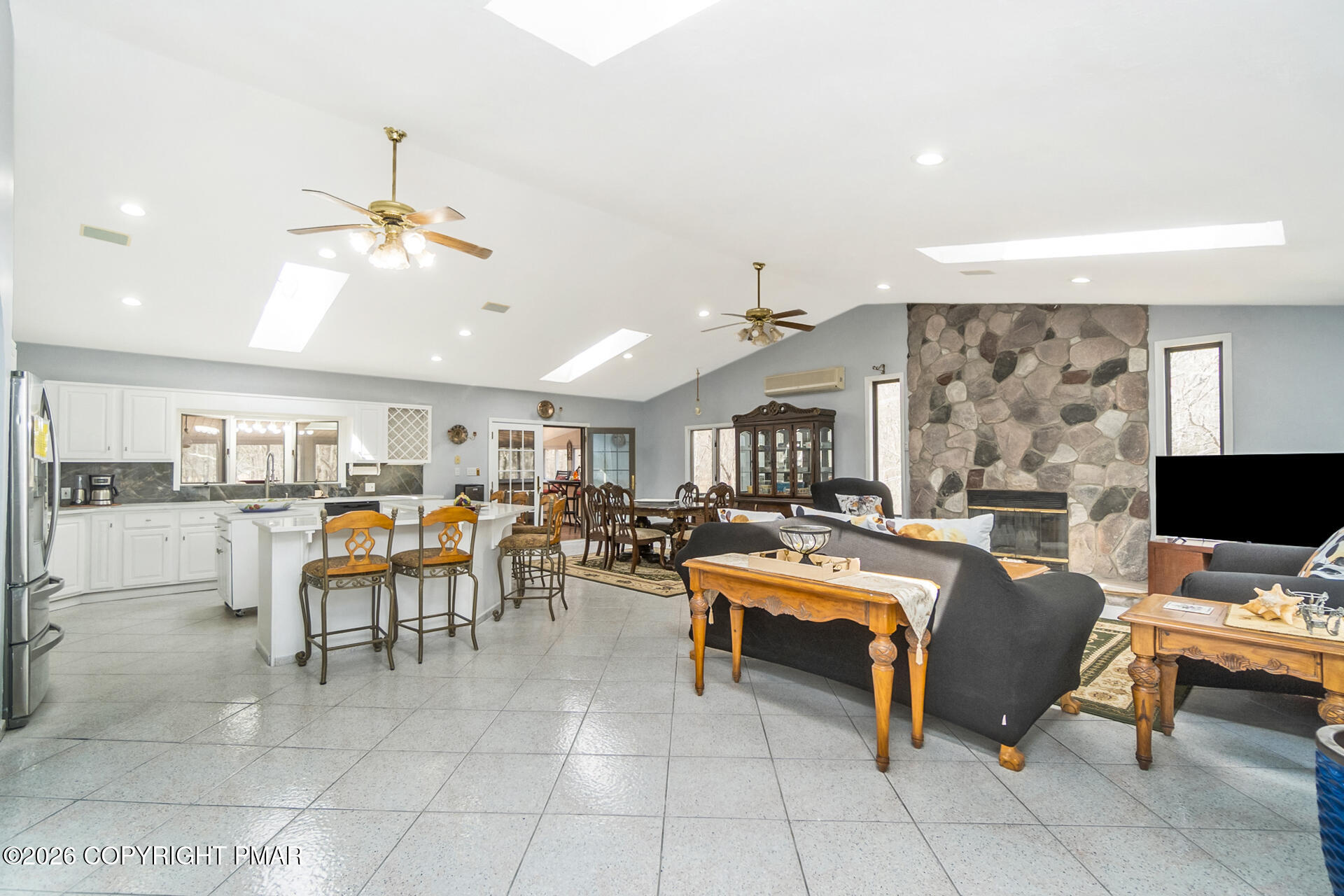 175 Winding Way Albrightsville, PA 18210 - Photo 7 of 54 a living room with furniture a flat screen tv and kitchen view