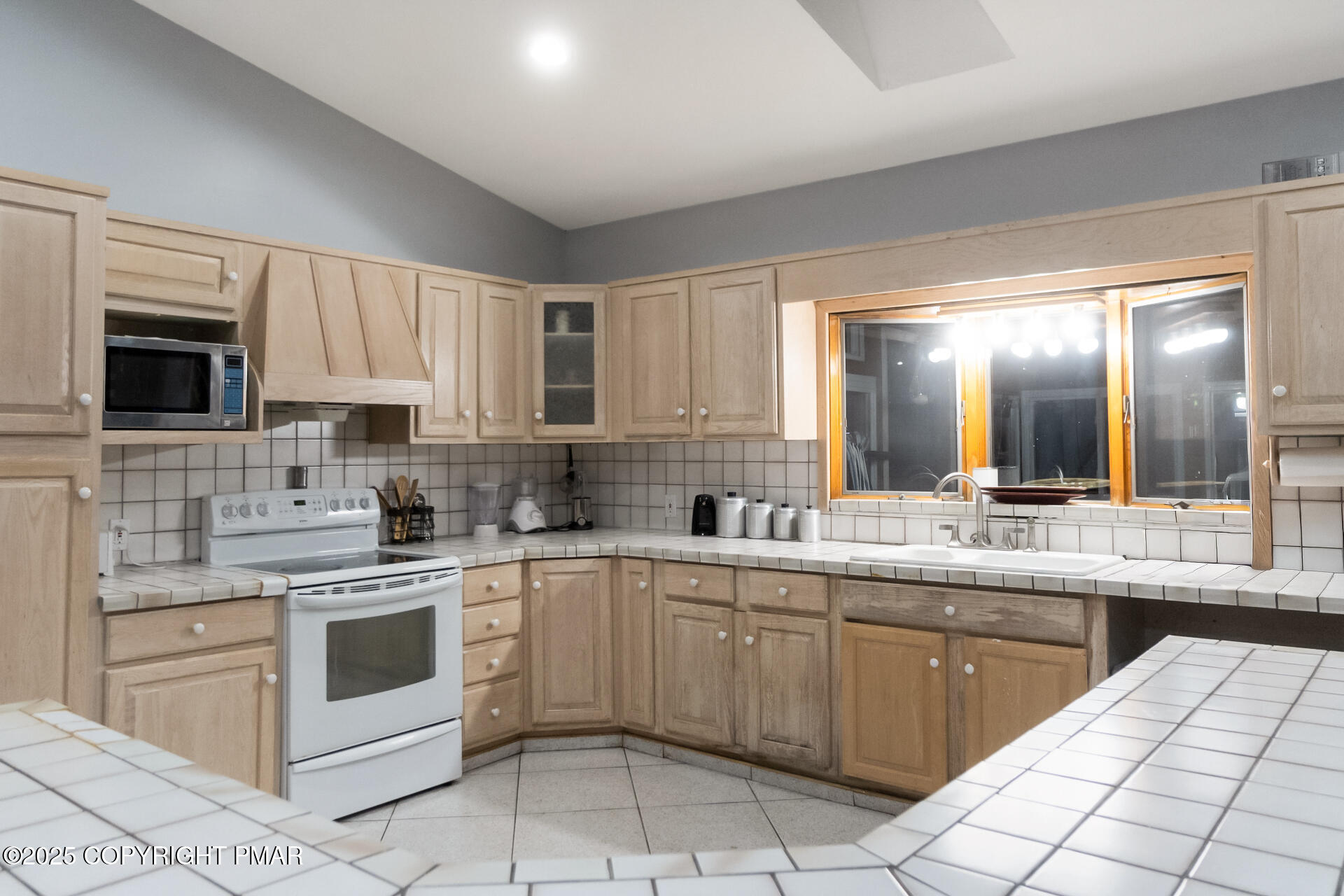 175 Winding Way Albrightsville, PA 18210 - Photo 10 of 50 a kitchen with a sink stove top oven and cabinets