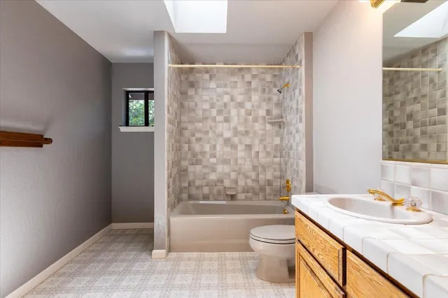 a view of a balcony with furniture and wooden floor