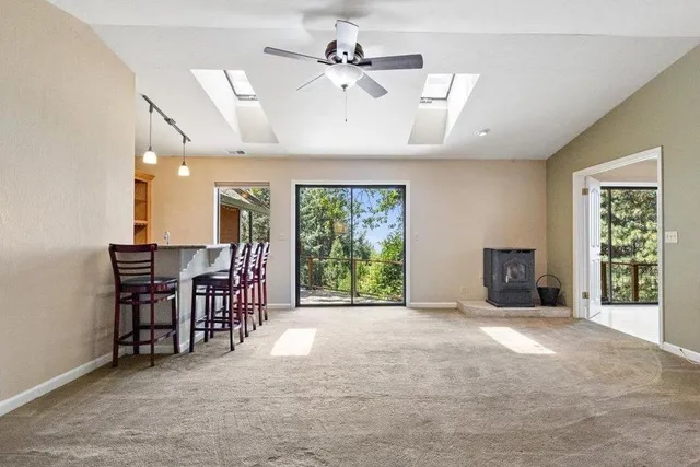 a view of house with outdoor seating